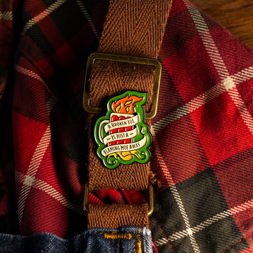 "A Broken Toe is Just a Flaming Moe Away" Pin