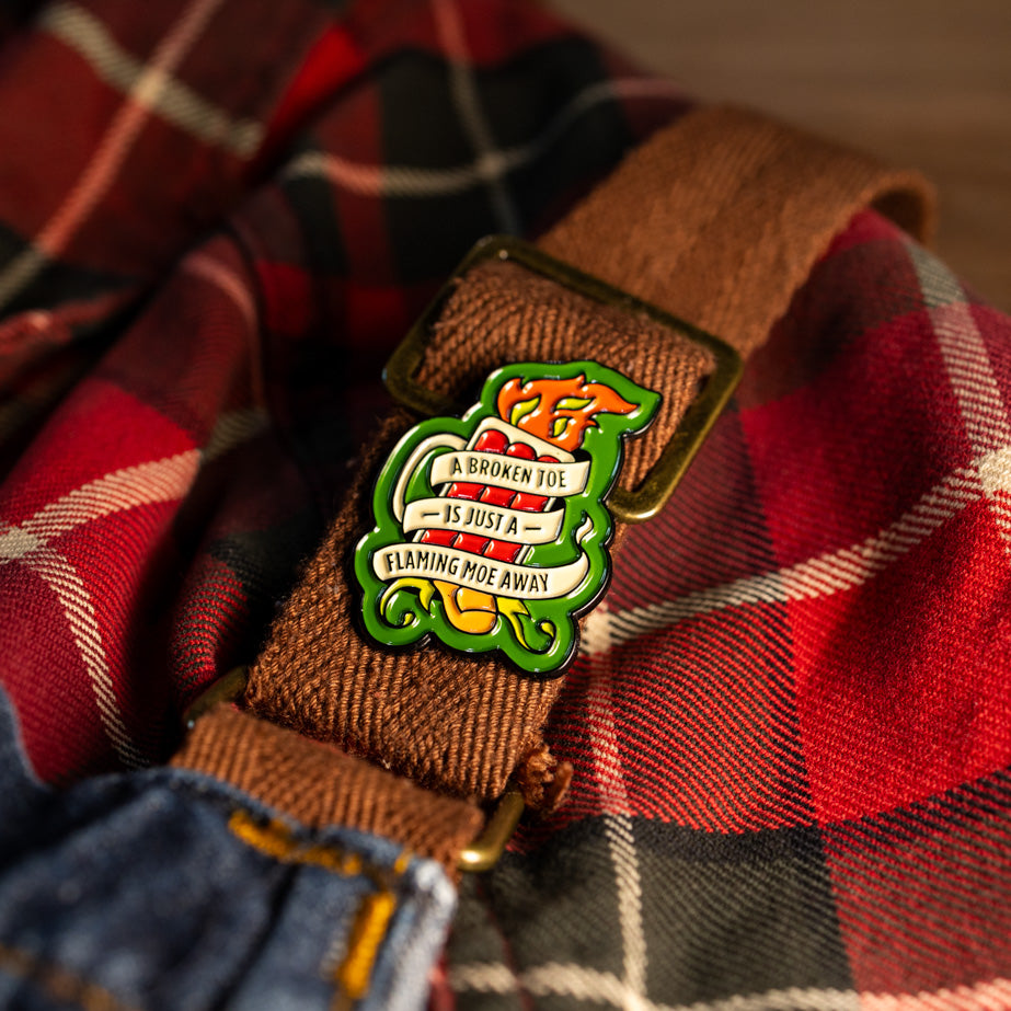 "A Broken Toe is Just a Flaming Moe Away" Pin