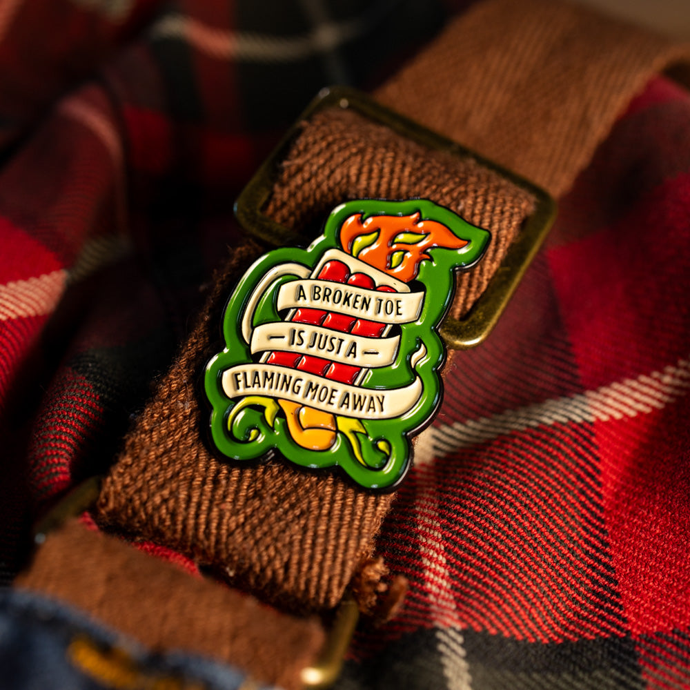 "A Broken Toe is Just a Flaming Moe Away" Pin